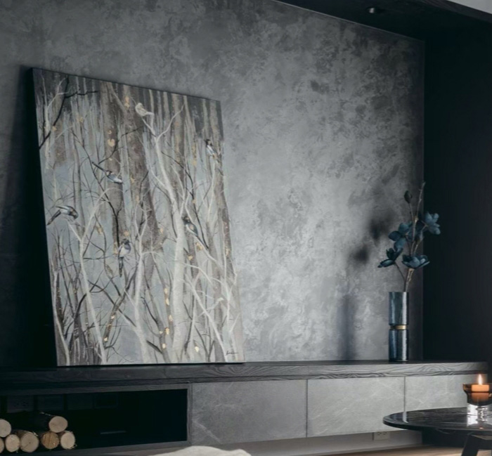 Applied by hand, each wall is a one-of-a-kind design, with options ranging from soft concrete textures to bold metallic and marble effects. 