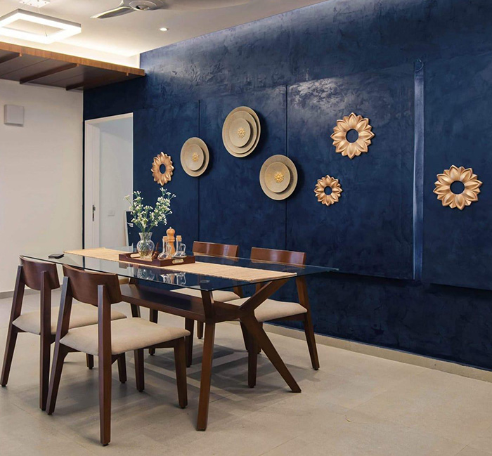 Applied by hand, each wall is a one-of-a-kind design, with options ranging from soft concrete textures to bold metallic and marble effects. 