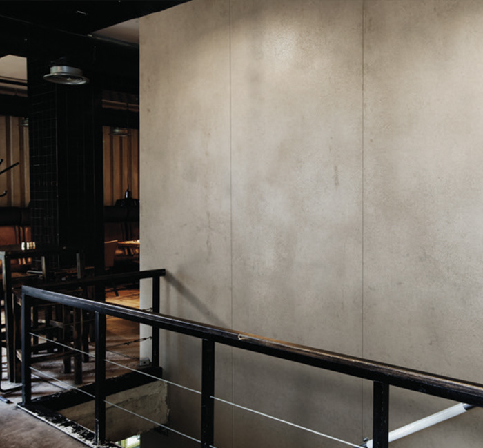 Applied by hand, each wall is a one-of-a-kind design, with options ranging from soft concrete textures to bold metallic and marble effects. 